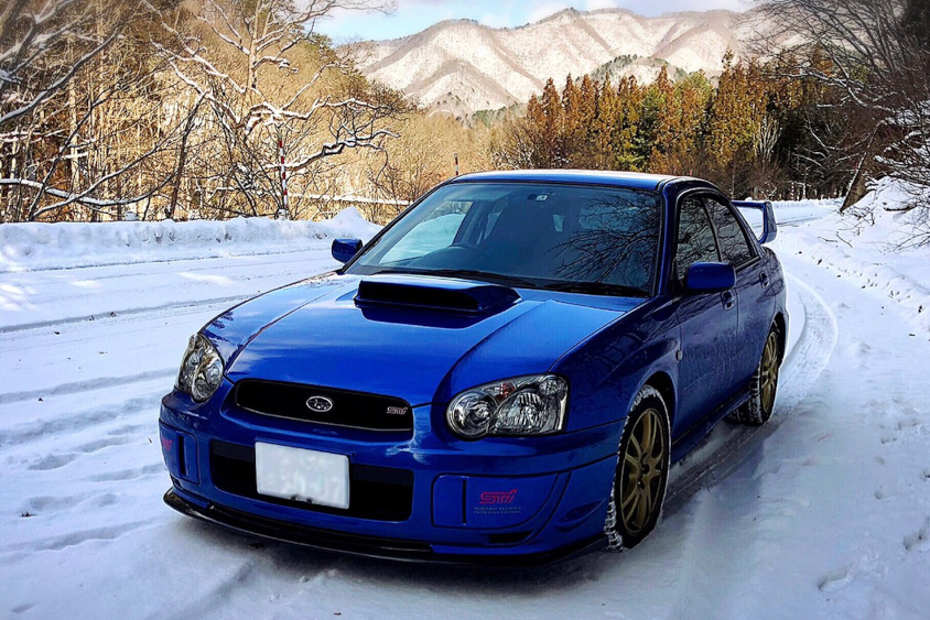 スバル・インプレッサWRXと雪景色